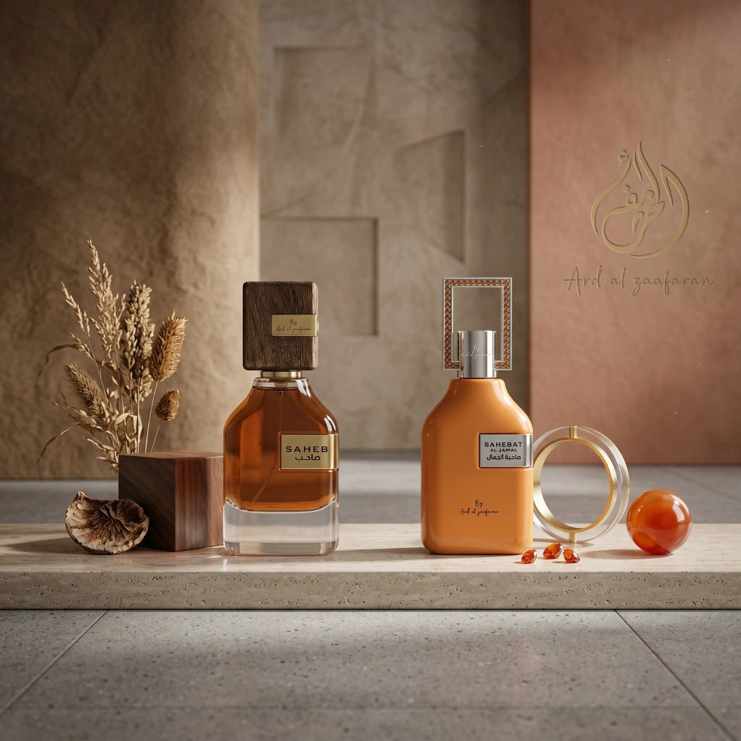 Bundle of two Saheb & Sahebat Al Jamal Eau de Parfum sprays by Ard Al Zaafaran, 70ml each, featuring elegant perfume bottles.