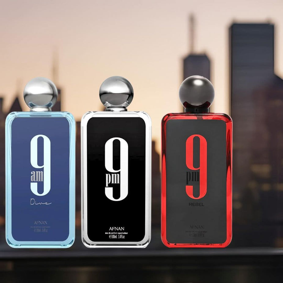 Afnan 9PM Rebel and 9AM Dive Eau de Parfum Spray bundle, 100ml bottles, featuring sleek black and clear glass bottles with spray caps.