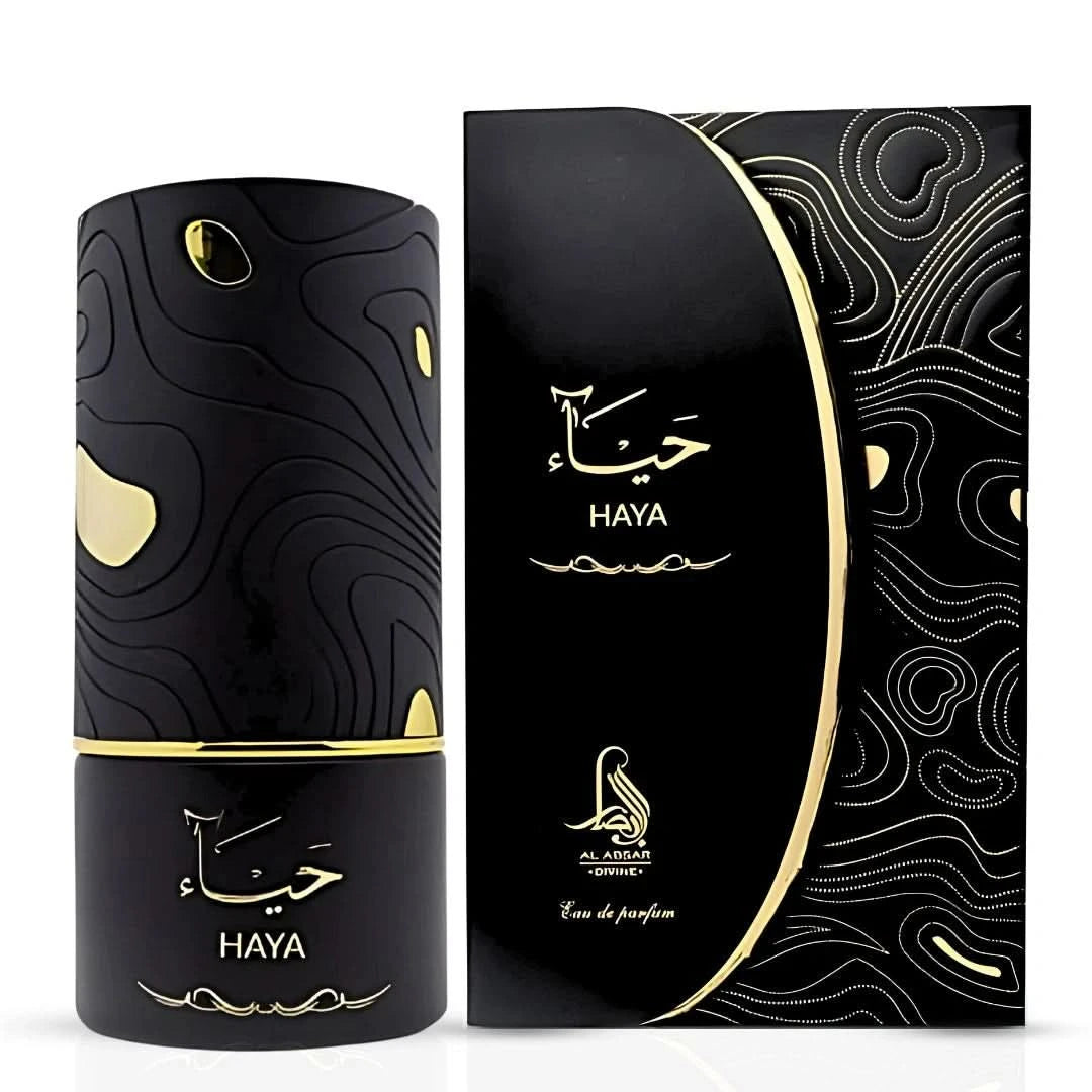 Al Absar Rania, Layla, and Haya Eau de Parfum spray bundle with three 100ml bottles, featuring elegant perfume bottles.