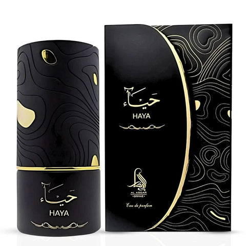 Al Absar Rania, Layla, and Haya Eau de Parfum spray bundle with three 100ml bottles, featuring elegant perfume bottles.
