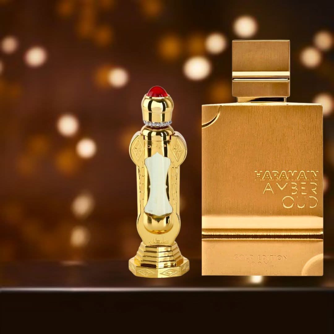 Al Haramain Amber Oud Gold Edition Eau de Parfum spray and Sultan perfume oil bottles, luxurious fragrance set.