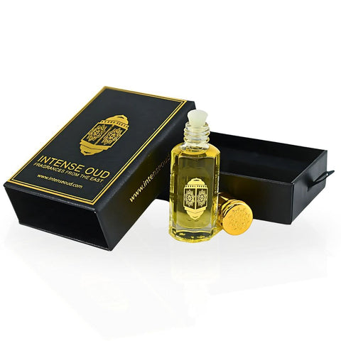 Intense Oud Santal Wood perfume oil in a 12ml glass bottle, displayed with a sleek black gift box.
