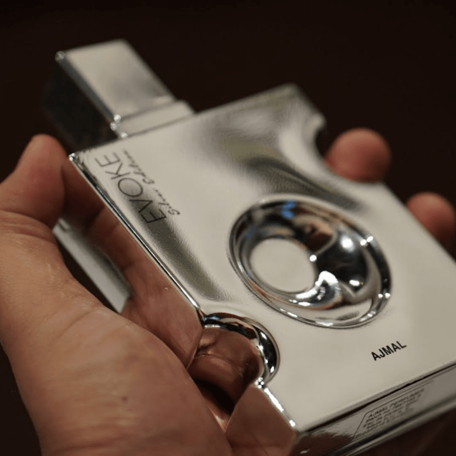 Evoke Silver Edition Ajmal Eau De Parfum for Men 90ML bottle with sleek silver packaging and modern design.