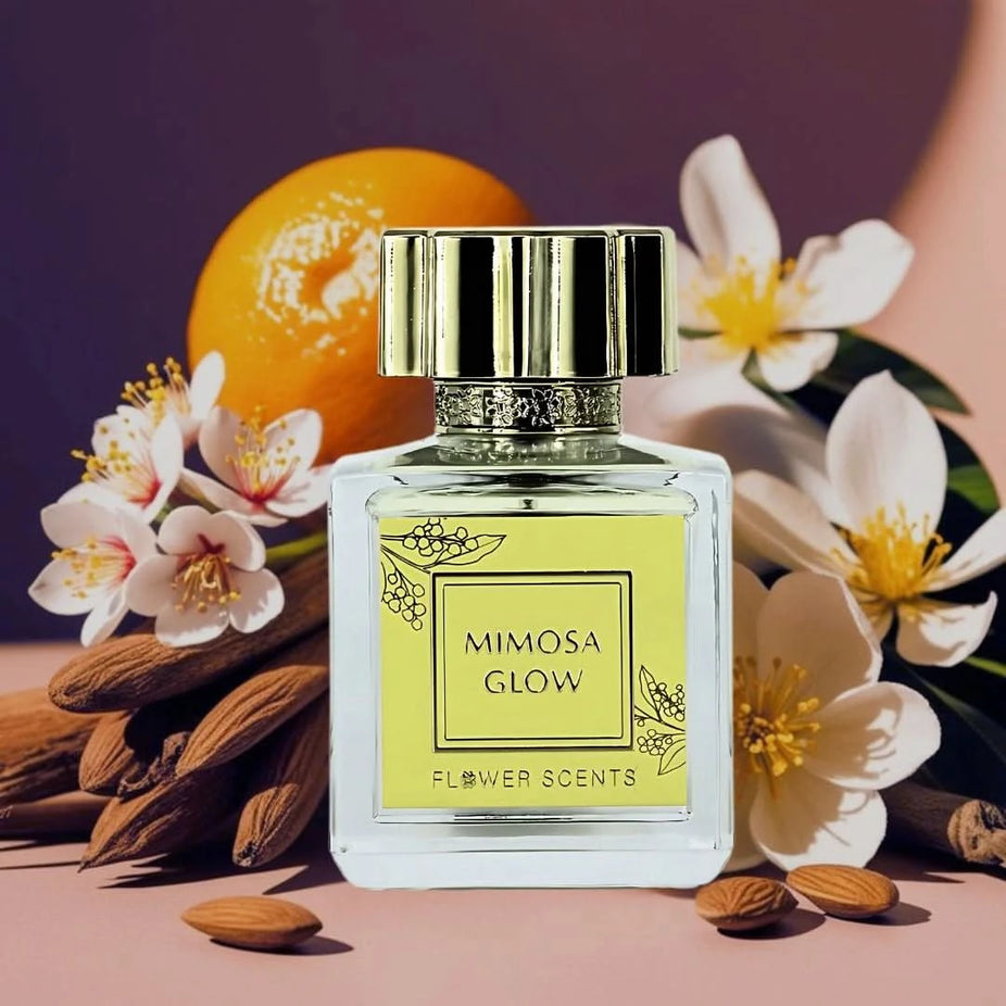 Flower Scents Mimosa Glow Eau de Parfum spray 65ml bottle, elegant design, showcasing the floral fragrance and perfume packaging.