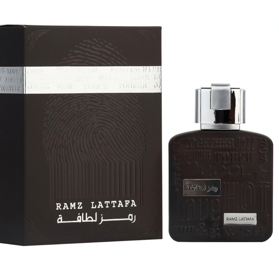 Lattafa Ramz Lattafa Silver Eau de Parfum spray 100ml bottle with sleek silver design and clear cap.