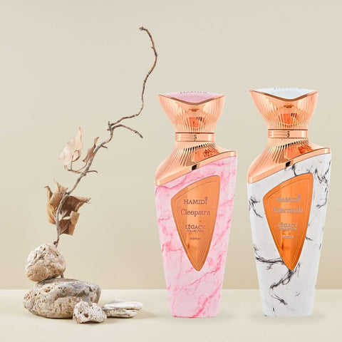 Hamidi Legacy Cleopatra and Merneith Eau de Parfum spray bundle with two 100ml bottles, elegant packaging and perfume bottles.