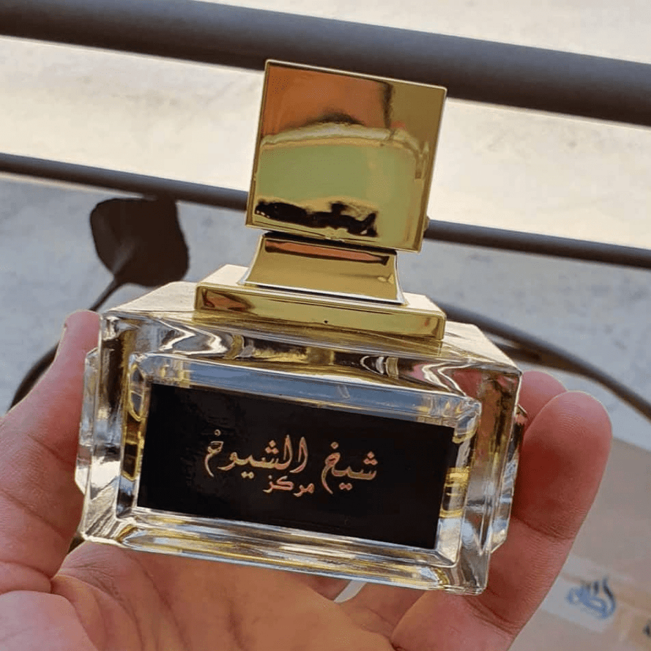 Lattafa Sheikh Al Shuyukh Marakaz 100ml Eau De Parfum bottle with elegant design and black cap.