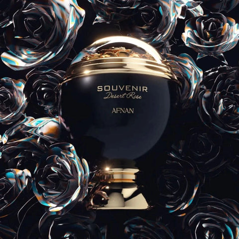Afnan Souvenir Desert Rose Eau de Parfum spray bottle with a velvet pouch, showcasing elegant packaging and floral design.