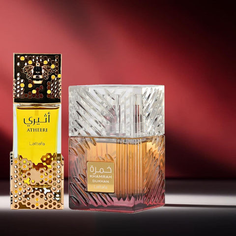 Lattafa Khamrah Dukhan and Atheeri Eau de Parfum spray bundle, 100ml each, featuring elegant bottles and distinct fragrance designs.