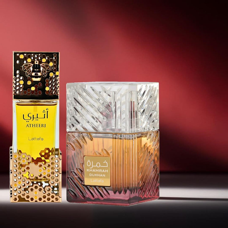 Lattafa Khamrah Dukhan and Atheeri Eau de Parfum spray bundle, 100ml each, featuring elegant bottles and distinct fragrance designs.