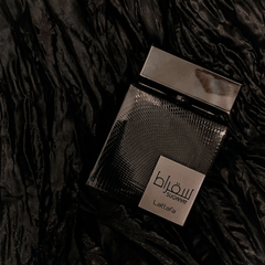 Suqraat Eau De Parfum Spray 100ML (3.4 OZ) By Lattafa (VELVET POUCH) - Intense Oud