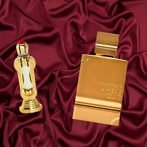 Al Haramain Amber Oud Gold Edition perfume spray and Sultan perfume oil bundle, featuring luxurious amber and oud fragrances.