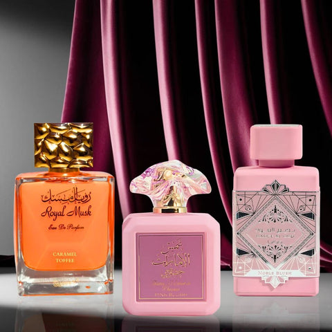 Bundle of three 100ml Intense Oud Eau de Parfum sprays featuring Pink Blush by Ard Al Zaafaran, Noble Blush by Lattafa, and Caramel Toffee by Surrati.