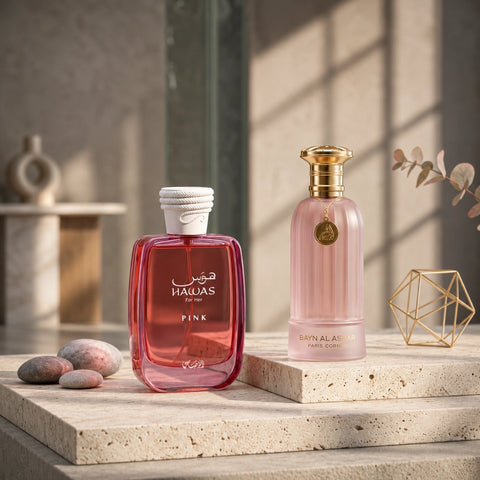 Intense Oud perfume bundle featuring Hawas Pink for Her Eau de Parfum 100ml and Bayn Al Asrar Eau de Parfum 80ml bottles.
