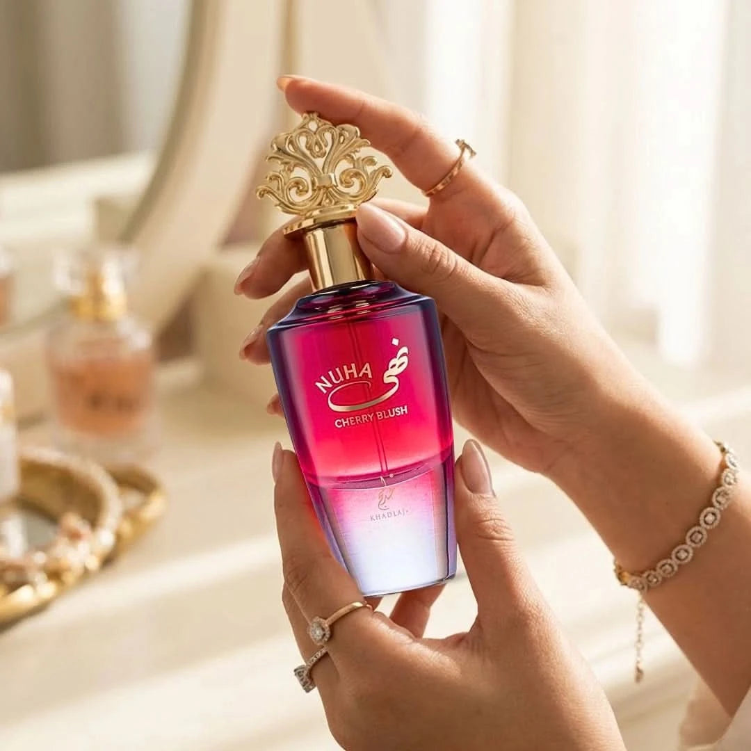 Nuha Cherry Blush Eau de Parfum spray by Khadlaj, 85ml, featuring a elegant pink bottle with floral accents.