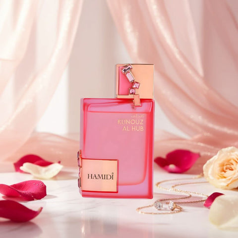 Hamidi Kunouz Al Hub Eau de Parfum spray in 100ml bottle, displayed with a velvet pouch, showcasing elegant perfume packaging.