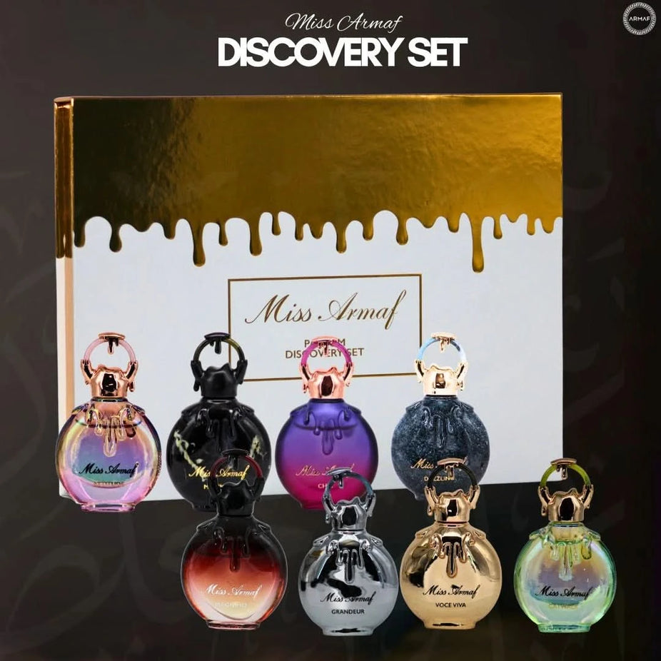 Armaf Miss Armaf Parfum Discovery Set with eight 5ml Eau de Parfum bottles in a gift box, showcasing diverse fragrance options.