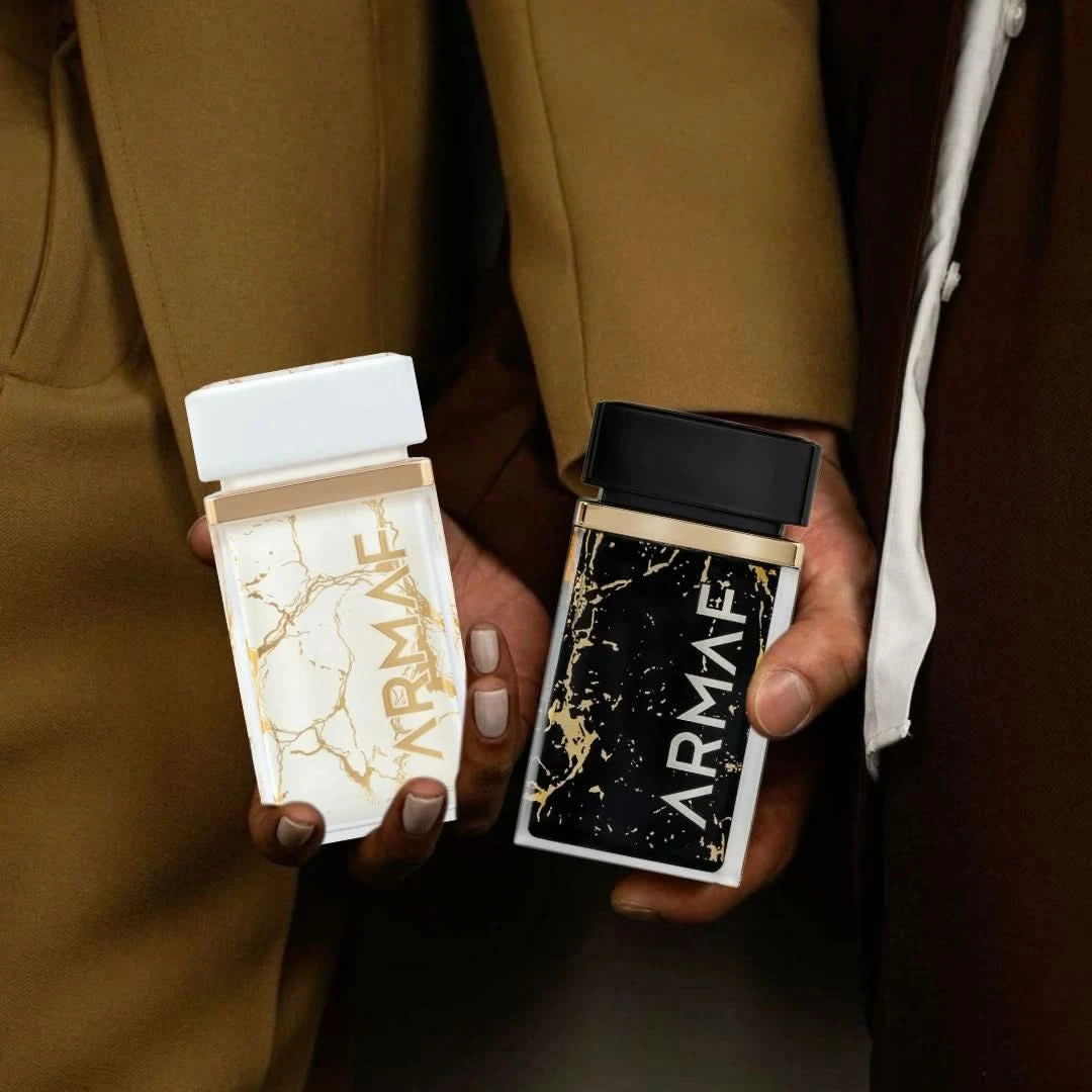 Bundle of Armaf Ombre D’or and Perle D’or Eau de Parfum sprays, 75ml each, featuring elegant perfume bottles with gold accents.