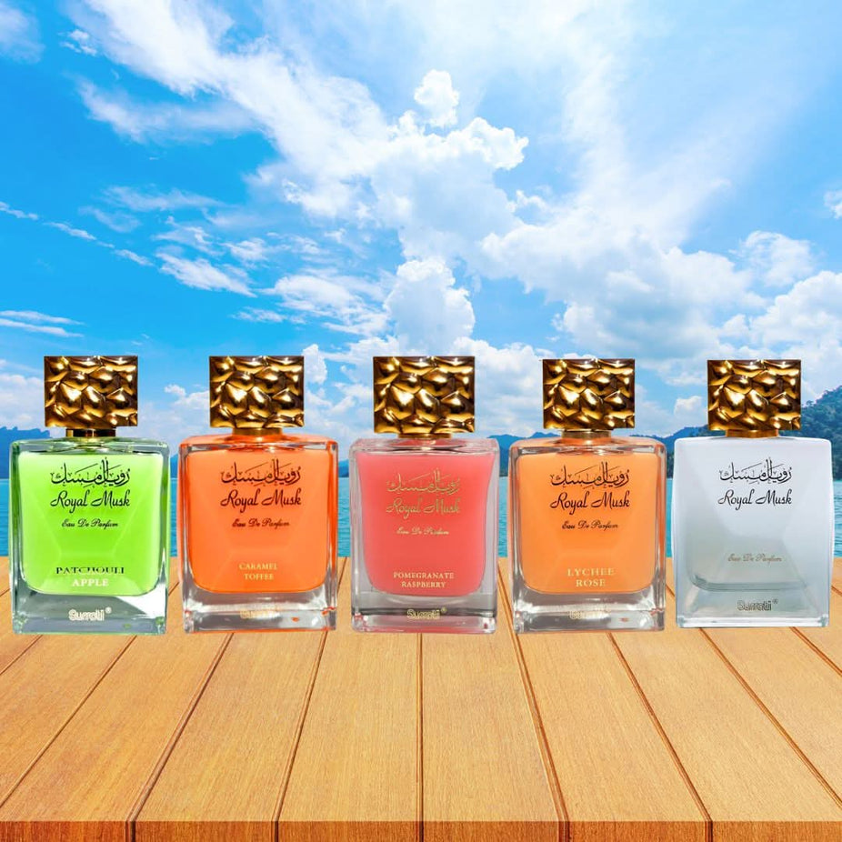 Surrati Royal Musk Caramel Toffee, Patchouli Apple, Pomegranate Raspberry, Lychee Rose & Royal Musk Eau de Parfum collection bottles.
