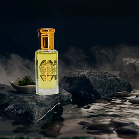 Intense Oud Casual Hangout perfume oil in a 12ml clear bottle with black gift box, showcasing the luxurious loose oil product.