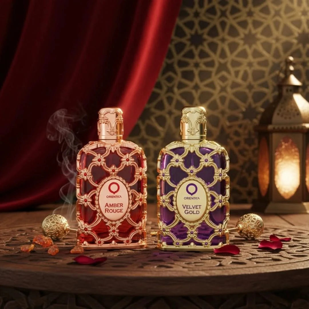 Orientica Amber Rouge and Velvet Gold Eau de Parfum sprays, 80ml, with elegant bottles showcasing luxurious fragrance designs.