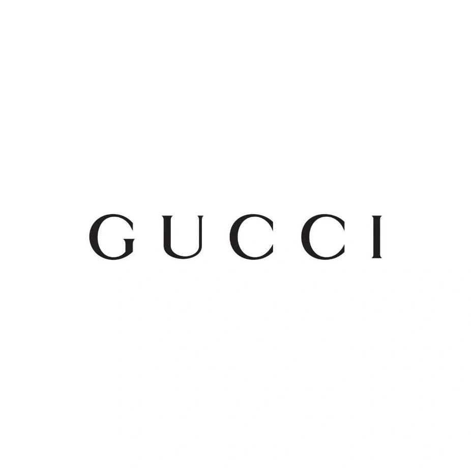 Gucci Bloom Eau de Toilette spray 100ml with elegant floral bottle, showcasing the iconic Gucci fragrance design.