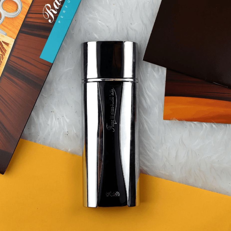 Rasasi Faqat EDP couple set with two 100ml perfume bottles, one for men and one for women, displayed in a bundle package.