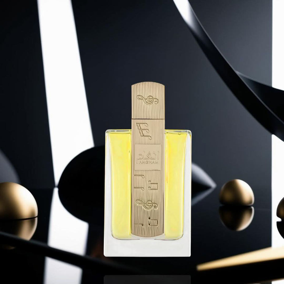 Lattafa Angham Eau de Parfum Spray 100ml bottle with elegant packaging and floral design.