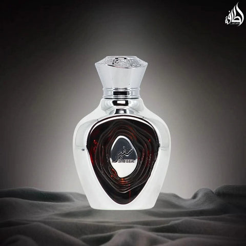 Lattafa Niche Emarati Safeer Eau De Parfum spray 100ml bottle with velvet pouch, elegant fragrance for women and men.