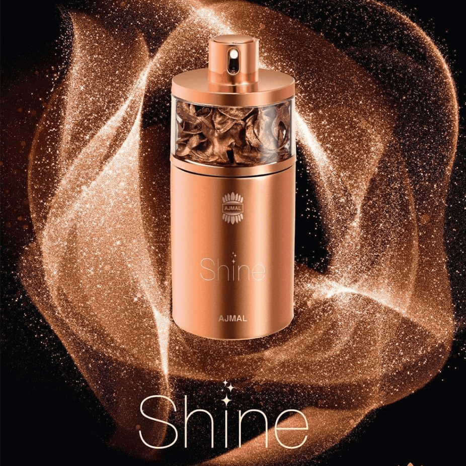 Ajmal Shine for Women Eau De Parfum 75ml bottle with elegant packaging and floral design, showcasing a feminine fragrance.