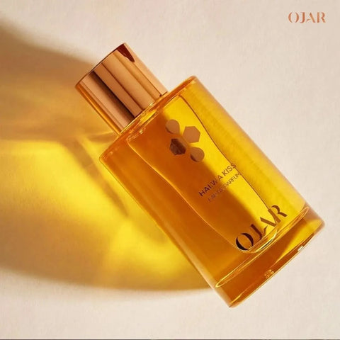 Ojar Halwa Kiss Eau De Parfum 100ml bottle with elegant design, showcasing the fragrance's luxurious appeal.