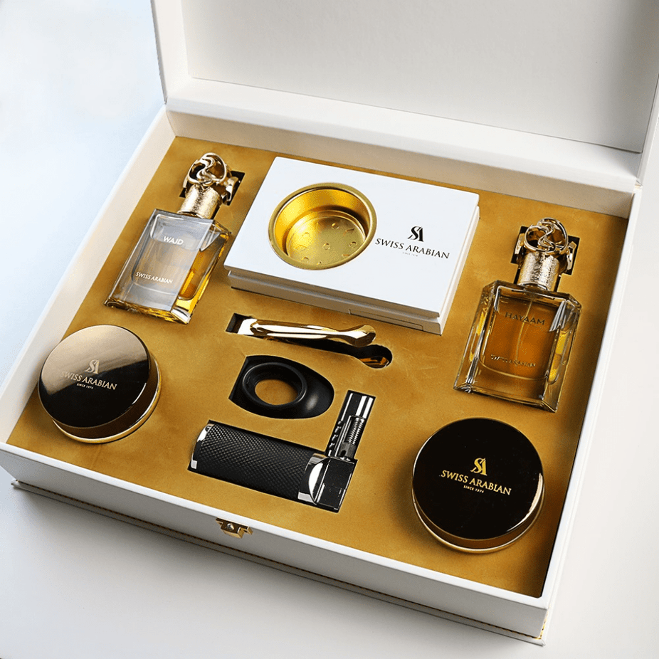 Swiss Arabian Bakhoor gift set with six decorative containers and incense sticks in an elegant packaging.