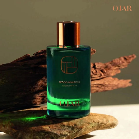 Ojar Wood Whisper Eau De Parfum 100ml bottle with elegant packaging and wooden accents, showcasing its sophisticated design.