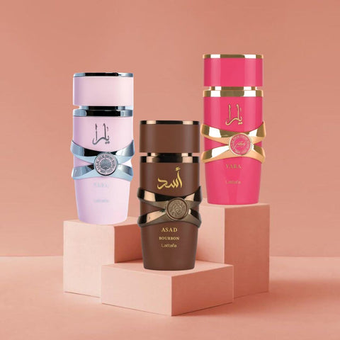 Lattafa Yara Candy and Asad Bourbon Eau de Parfum spray bundle, featuring two 100ml bottles with elegant packaging.