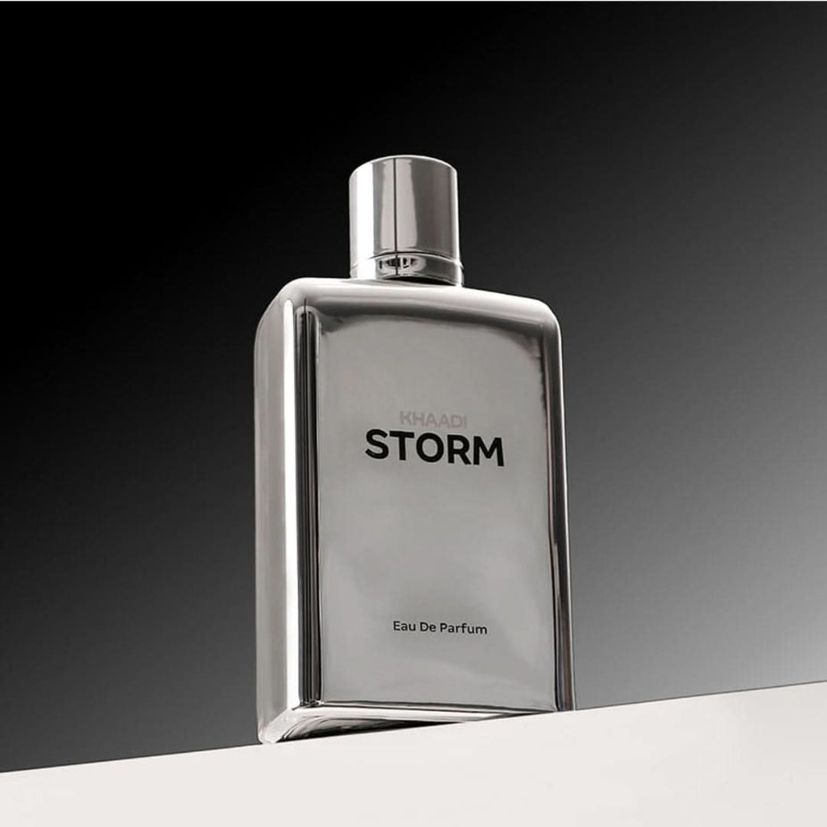 Khaadi Storm Eau de Parfum Spray 100ml, elegant perfume bottle with a sleek design and floral accents.