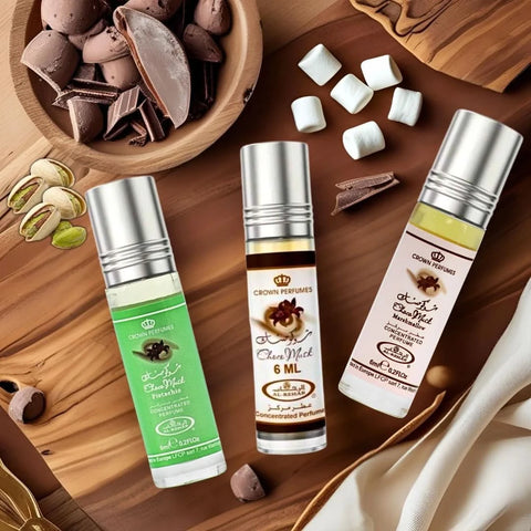 Al Rehab Choco Musk perfume oil bundle with marshmallow and pistachio scents, 6ml bottles, showcasing the colorful packaging.