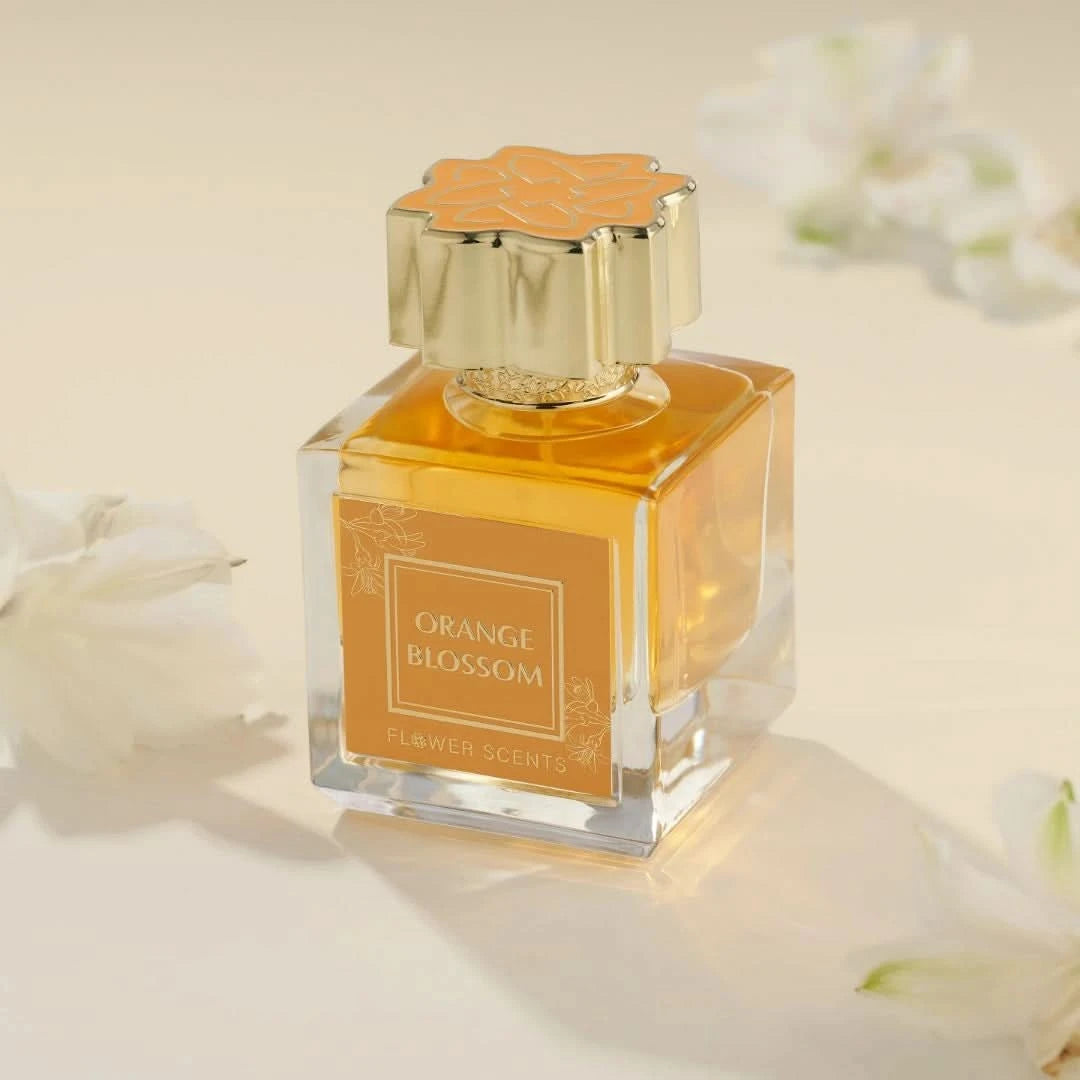 Flower Scents Orange Blossom Eau de Parfum spray in a 65ml bottle with velvet pouch, showcasing the elegant fragrance packaging.