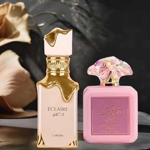Bundle of Lattafa Eclaire and Ard Al Zaafaran Pink Blush Shams Al Emarat Khususi 100ml Eau de Parfum sprays, featuring elegant bottles.