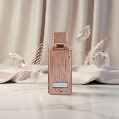 Hamidi Envy Rose Gold Eau de Parfum spray 100ml with velvet pouch, featuring a sleek rose gold bottle and elegant design.