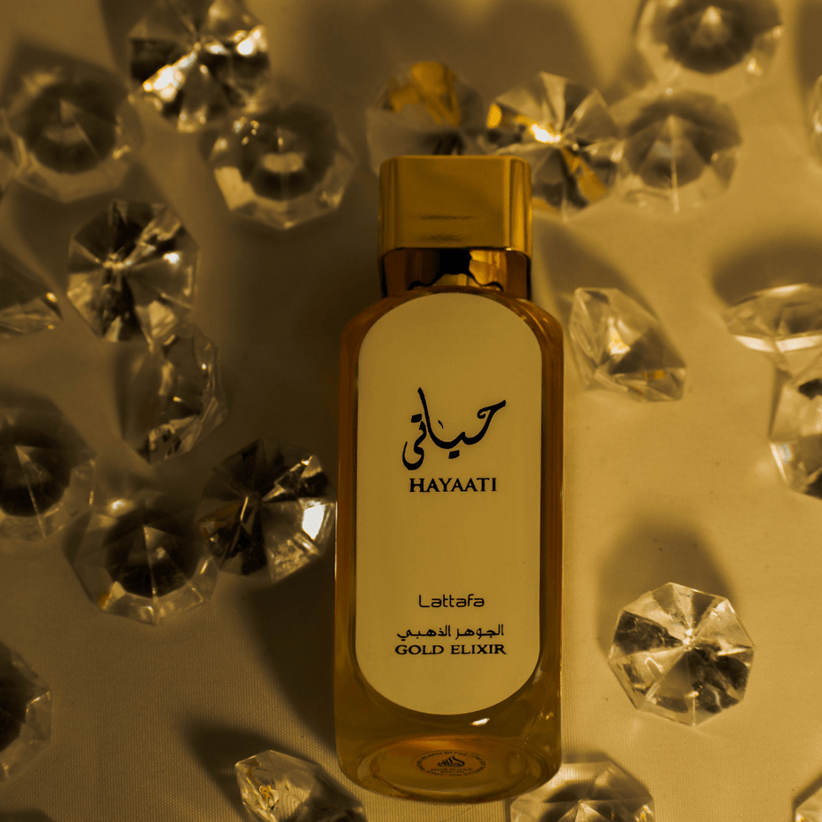 Lattafa Hayaati Gold Elixir Eau De Parfum for Women, 100ML bottle with elegant gold accents and floral fragrance details.