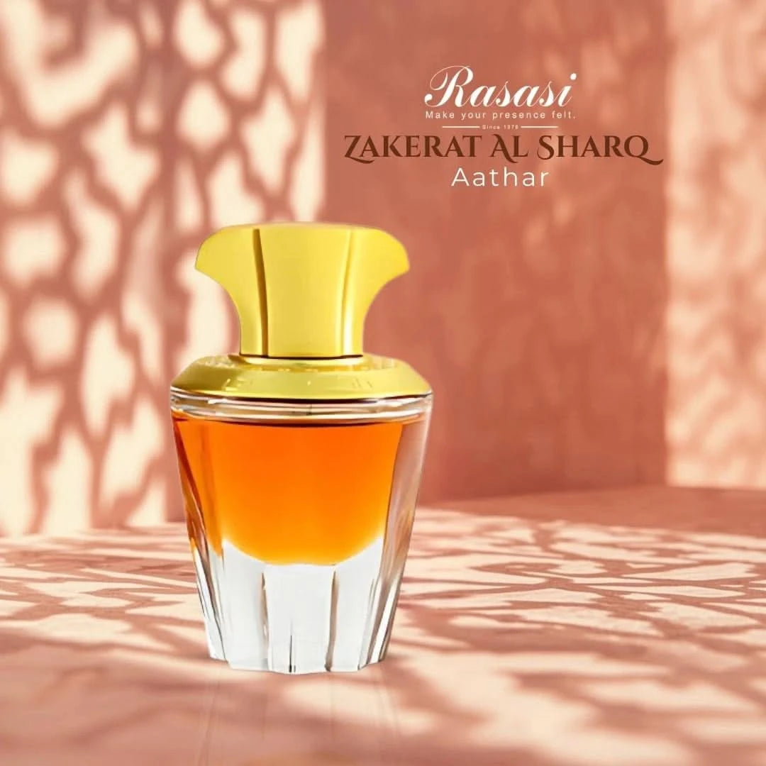 Rasasi Zakerat Al Sharq Aathar concentrated perfume oil 20ml bottle with elegant packaging and traditional design.