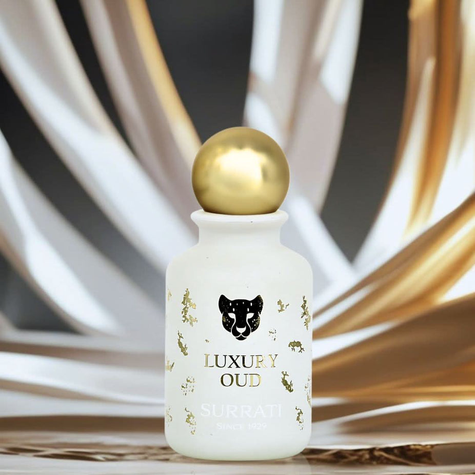 Surrati Luxury Oud Eau de Parfum spray bottle, 100ml, with elegant design and luxurious fragrance for men and women.