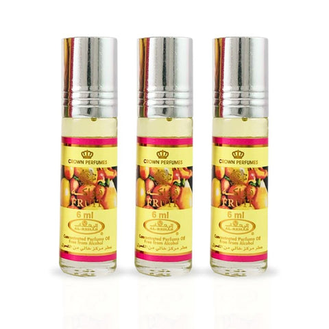 Three 6ml bottles of Al Rehab fruit perfume oil CPO, concentrated perfume oil with vibrant fruit scent in clear glass bottles.