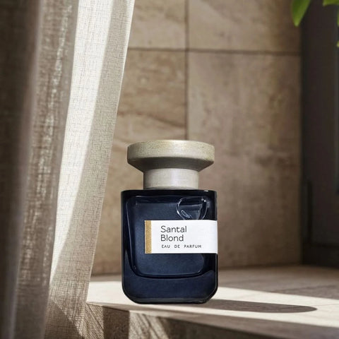 Atelier Materi Santal Blond Eau de Parfum spray bottle, 100ml, featuring elegant packaging and the fragrance bottle design.