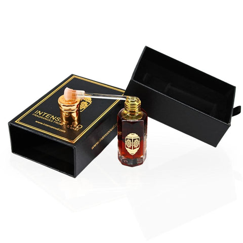 Intense Oud Mukhallat Al Zafran perfume oil 12ml in a black gift box, featuring a clear glass bottle and aromatic scent.