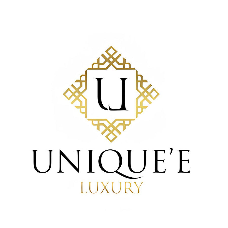 Unique'e Luxury Akdeniz Extrait de Parfum Spray 100ml bottle with elegant design and clear glass, showcasing its luxurious fragrance.
