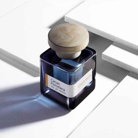 Atelier Materi Cacao Porcelana Eau de Parfum spray bottle, 100ml, with elegant design and floral accents visible in the image.