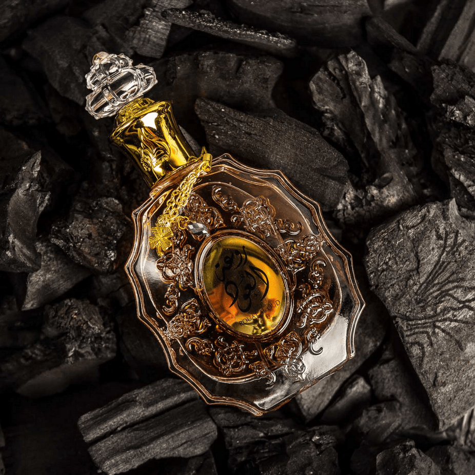 Rouat Al Oud Eau de Parfum spray by Lattafa, 100ml bottle with elegant packaging, showcasing the luxurious fragrance design.