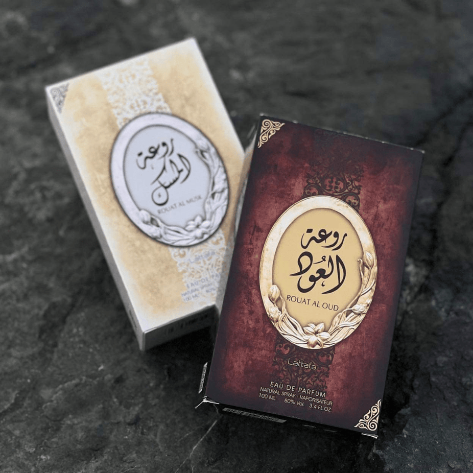 Lattafa Rouat Al Oud Eau de Parfum spray bottle, 100ml, with elegant packaging and a luxurious fragrance design.