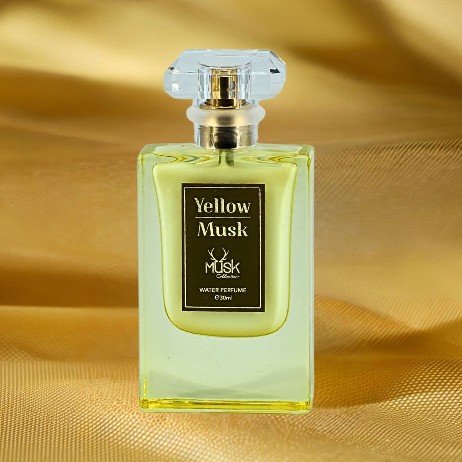 Hamidi Yellow Musk Water Perfume spray 30ml bottle with vibrant yellow cap and sleek design, reflecting refreshing, floral scent.